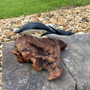 John Perry Penguins on Burlwood base 5 inches tall 8 inches wide, original.